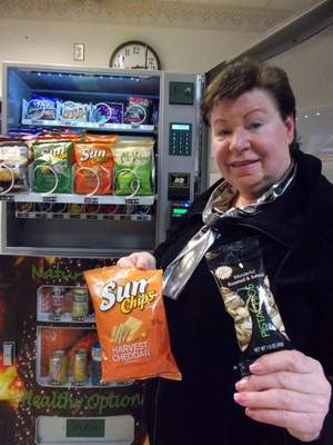 Grandmother fills vending machines to boost income